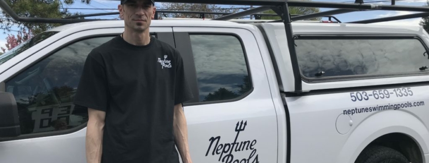 owner in front of Neptune truck